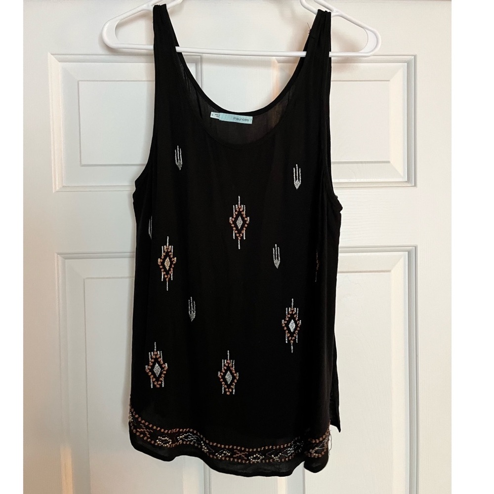 Black tank top with design on front